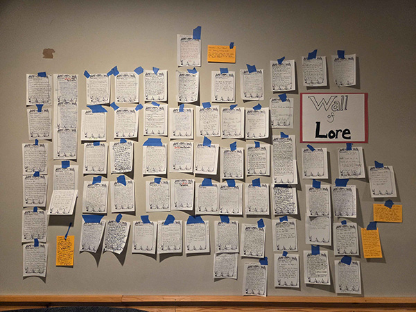 wall of lore many sheets of writing on a wall